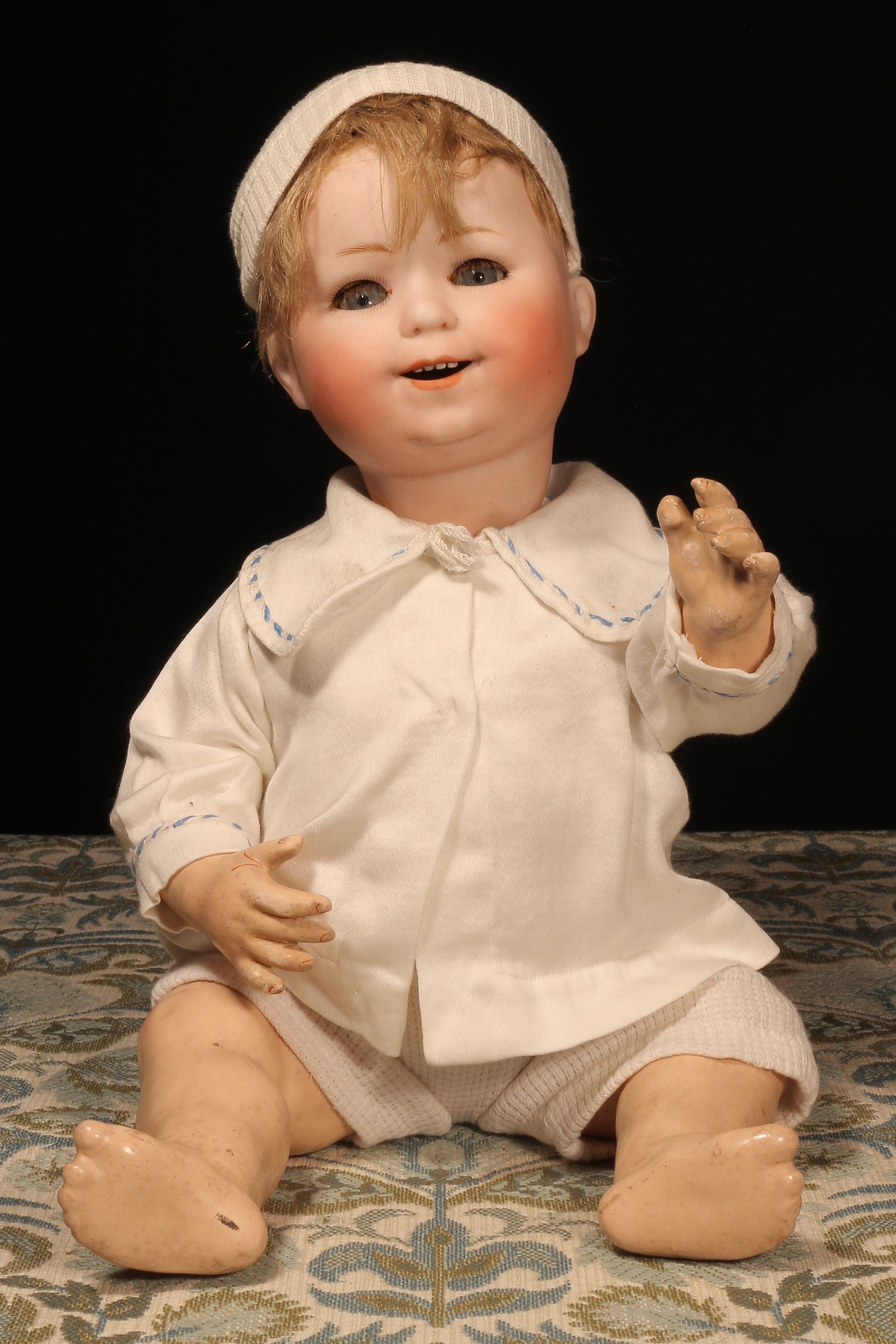A William Goebel (Germany) bisque head and painted jointed composition bodied character doll, the