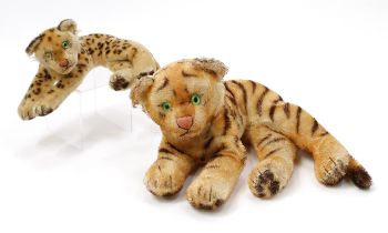 A 1950's/1960's Steiff (Germany) mohair Leopard, lying flat, 17cm long; another, as a Tiger, lying