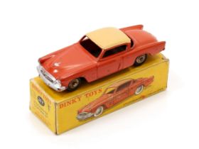 Dinky Toys (France) 24Y Studebaker Command coupé, dark orange body with tan roof, plated ridged