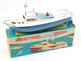 A 1960's Sutcliffe Model tinplate and battery operated 'Kestrel' cruiser, pale blue hull with