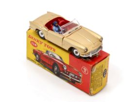 Dinky Toys 114 Triumph Spitfire, metallic gold body, red interior with seated plastic driver figure,