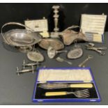 A collection of silver plate, cae baskets, wine funnel, etc