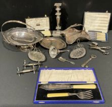 A collection of silver plate, cae baskets, wine funnel, etc