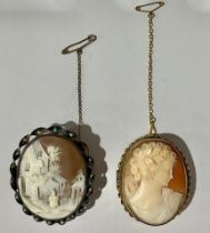 A 9ct gold mounted carved shell cameo brooch, beauty in profile, marked 9ct, safety chain, 4.5cm