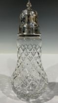 An Elizabeth II silver mounted clear glass sugar caster, the domed pierced cover star cut, knop