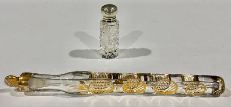 A Georgian scent phial; a cut glass silver topped scent (2)
