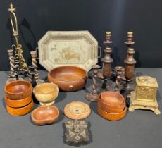 A pair of early 20th century oak spirally turned candlesticks, 26cm high; another pair, smaller; a