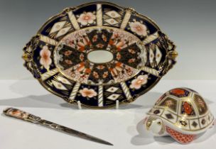 A Royal Crown Derby paperweight, Turtle, printed in the Imari 1128 pattern, gold stopper; a Royal