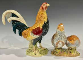 A Beswick model, of a pair of partridges, model no. 2064, 15cm high; another, Gamecock, model no.