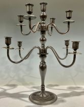 A bronze eight branch candelabrum