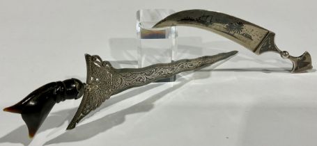 An Iraqi silver and niello letter knife, as a jambiya dagger; another, Indonesian, as a Malayan