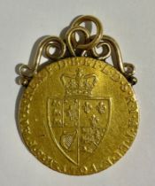 A George III gold spade guinea, 1794, with 9ct gold mount as a pendant, 9.5g