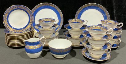An early 20th century Spode Copeland's China tea service for twelve, decorated with borders of