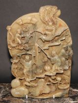 A Chinese soapstone tablet or screen, profusely carved with figures, mythical beasts and