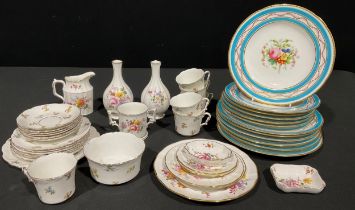 A set of six 19th century Minton dessert plates, decorated with flowers, the borders with bands of