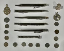 A Victorian silver fob, Birmingham 1899; another silver fob; four silver propelling pencils; a small
