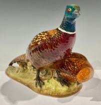 A Beswick model, of a pair of Pheasants, model no. 2078, 24cm wide