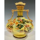 A 'Bretby' type two handled art pottery vase, c.1910