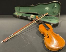 A cased violin and bow, Stradivarius label