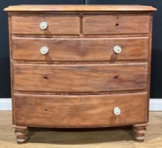 A Victorian mahogany bowfront chest, of two short and three long graduated drawers, turned feet,