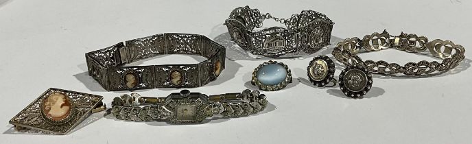 A silver filigree bracelet, marked 1000; a silver filigree brooch, set with a portrait cameo, marked
