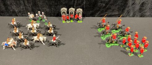 Toys & Juvenalia - a collection of Britains plastic figures, including Canadian Mounties etc,