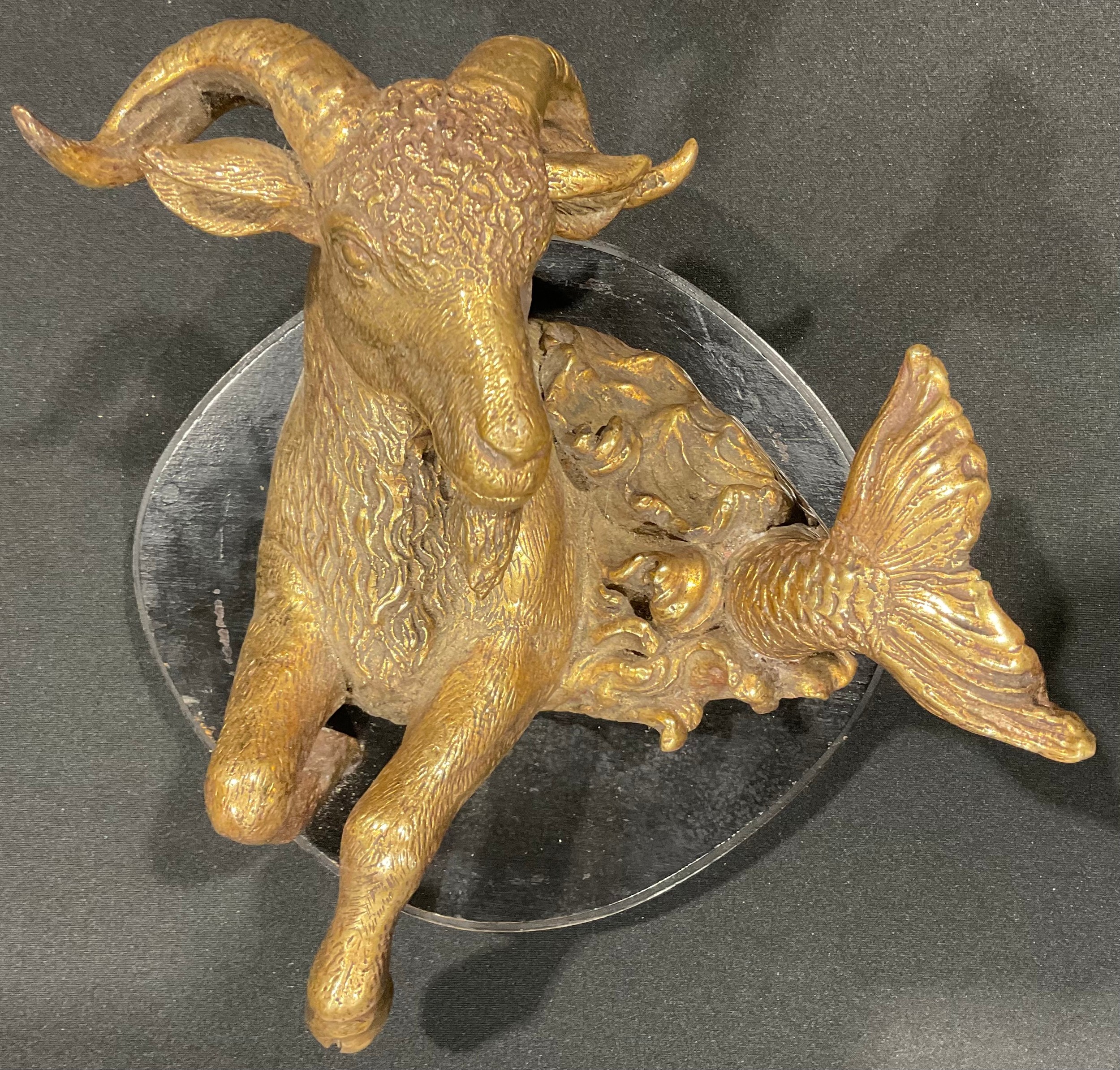 A gilt bronze bull Taurus Ware plaque