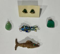 A Chinese enamel and silver fish; a gilt fish; pendants; earrings