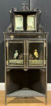 An Aesthetic Movement Japonisme ebonised and painted floor-standing corner cabinet, 143cm high, 59cm