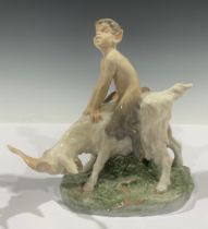 A Royal Copenhagen figure group, Faun On Goat, model no. 737, 20.5cm high