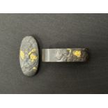 Japanese Sword Kashira and matching design Fuchi. Signed. (2)