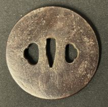 Japanese Sword Tsuba in bronze, signed. 79mm in diameter.