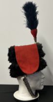 British Yeomanry Officers Busby with Blue/Red Plume. Silver cords to body of busby. Lion mask