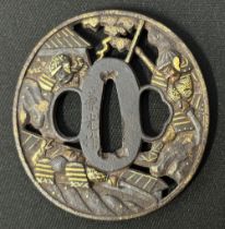 Japanese Sword Tsuba in iron, featuring Samurai warriors. Signed Kanemitsu saku. Made by