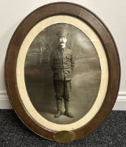 WW1 British Framed Reprint Portrait Photograph in an oval frame with brass plaque reading "Sapper