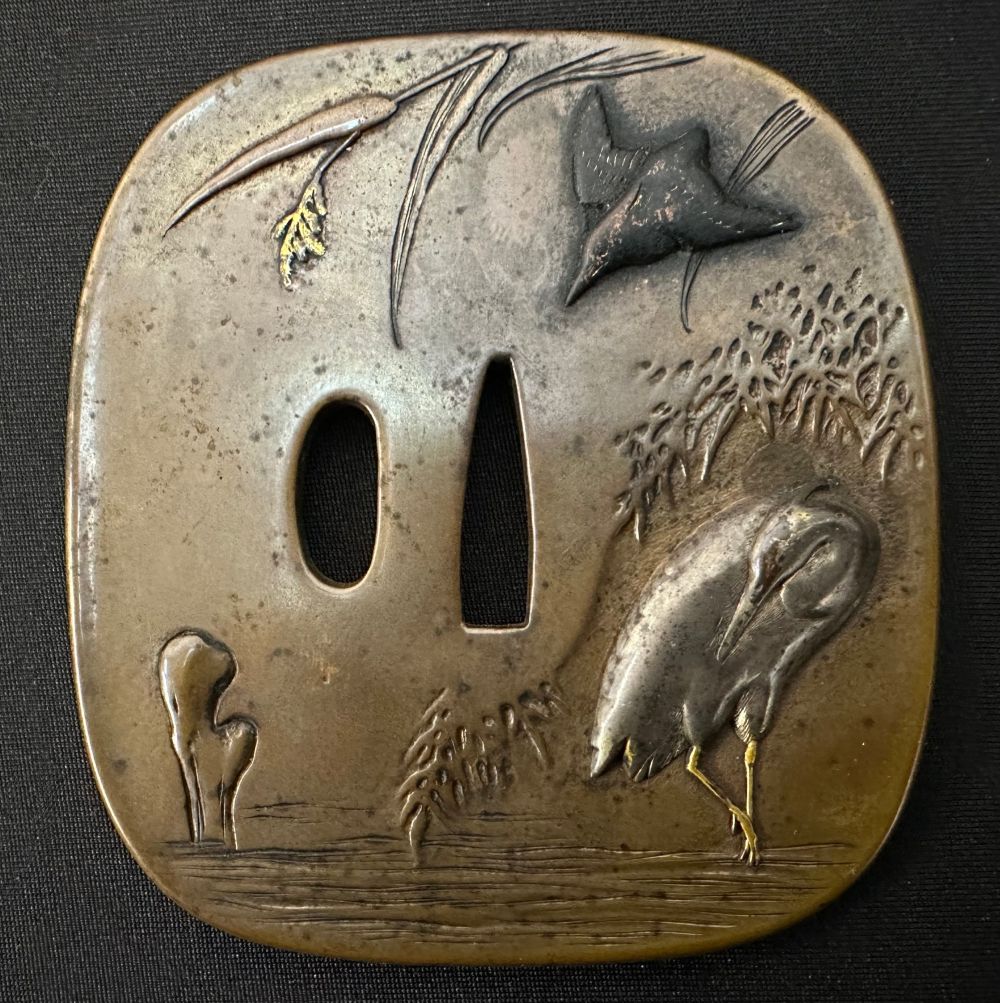 Japanese Sword Tsuba in bronze featuring a Crane. Signed Hisamasa Fukuda. Large sized example 89mm x