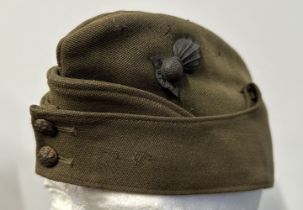 WW2 British Royal Artillery Officers Field Service Cap complete with officers bronze Flaming Grenade