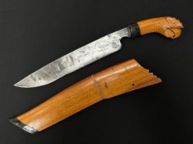 Indonesian Golok with single edged blade 270mm in length. Marked with three stars. Wooden grip in