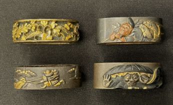 Japanese Sword Fuchi collection. Four different examples, all signed.