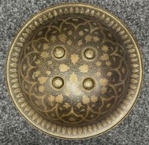 Indo Persian Dhal Shield in brass with black enamel floral decoration. 378mm in diameter. Reverse