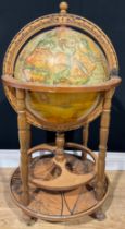 A 20th century Italian style liquor cabinet in the form of a globe, standing on four turned wooden