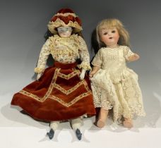 Toys & Juvenalia - a German bisque head and painted composition bodied doll, the bisque head inset