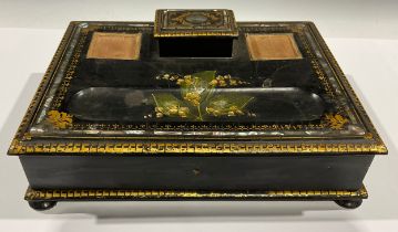 A 19th century papier-mâché rectangular desk standish, abalone inlaid, painted with lily of the