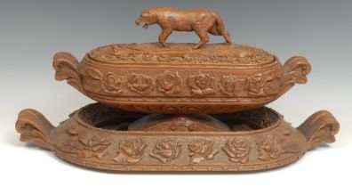 A continental carved oak table centre on stand, profusely carved with roses, the cover with large