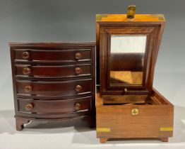 A miniature mahogany bow front chest of drawers, four graduated cockbeaded drawers, knop handles,