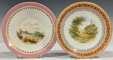 A late 19th century Worcester plate, painted with rural cottage scene, within gilt floral and pink