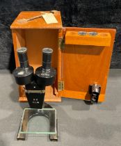 A binocular microscope, by Charles Perry & Co Ltd, London, D.M.S, No.3, 2.0 UL18, 1932, cased