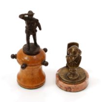 An early 20th century bronze novelty miniature letter rack, mounted with a bust of William