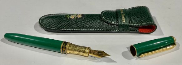 A Michel Jordi fountain pen, green leather case