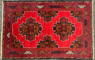 Oriental Rugs and Carpets - a Baluchi rug, 134cm x 88cm